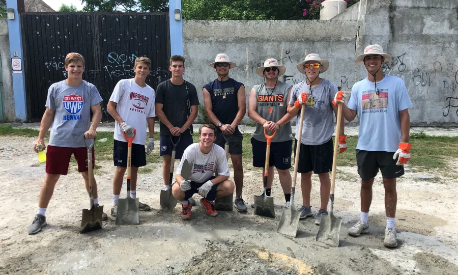 A group of baseball 4 christ players volunteering in a Mission to Mexico.