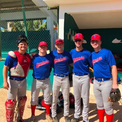 A group of baseball players posing for a photo.